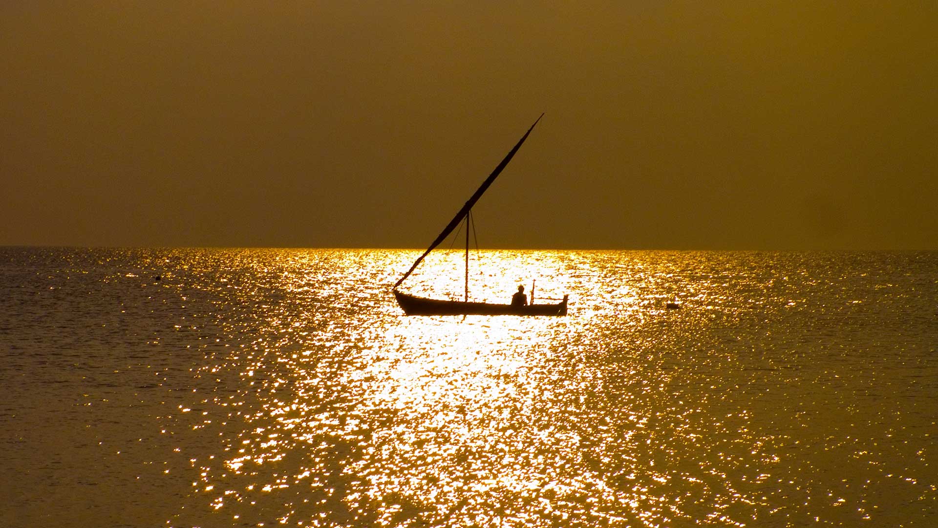 Maldives, fishing boat at sunset
