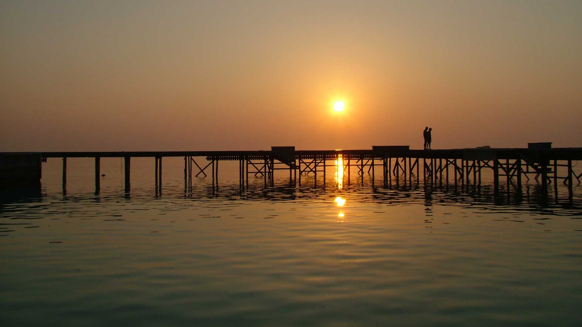 Maldives, sunset over jetty