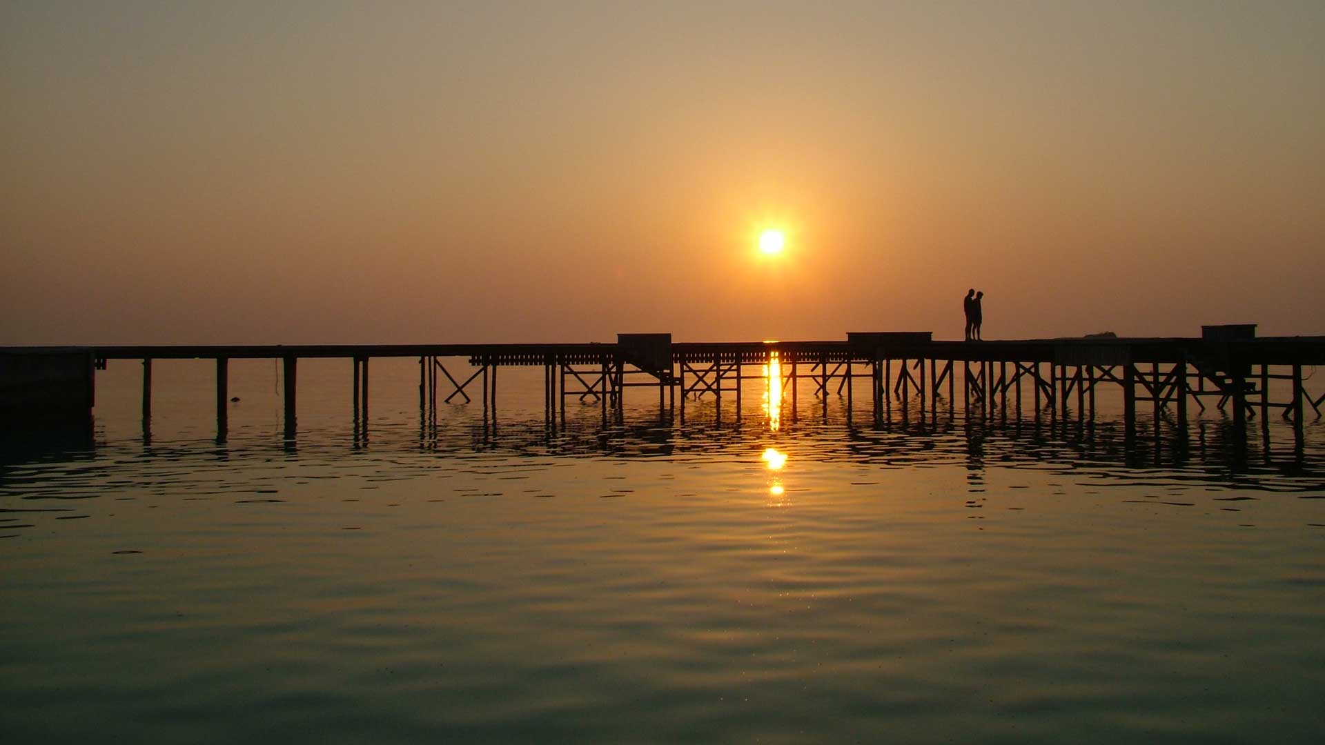 Maldives, sunset over jetty